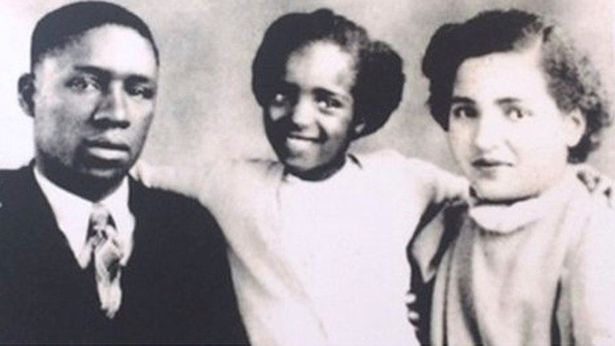 Black and white photo of a black family